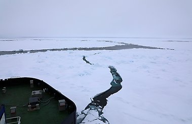Caption: Oden pushes through an area of heavy ridging in the sea ice.